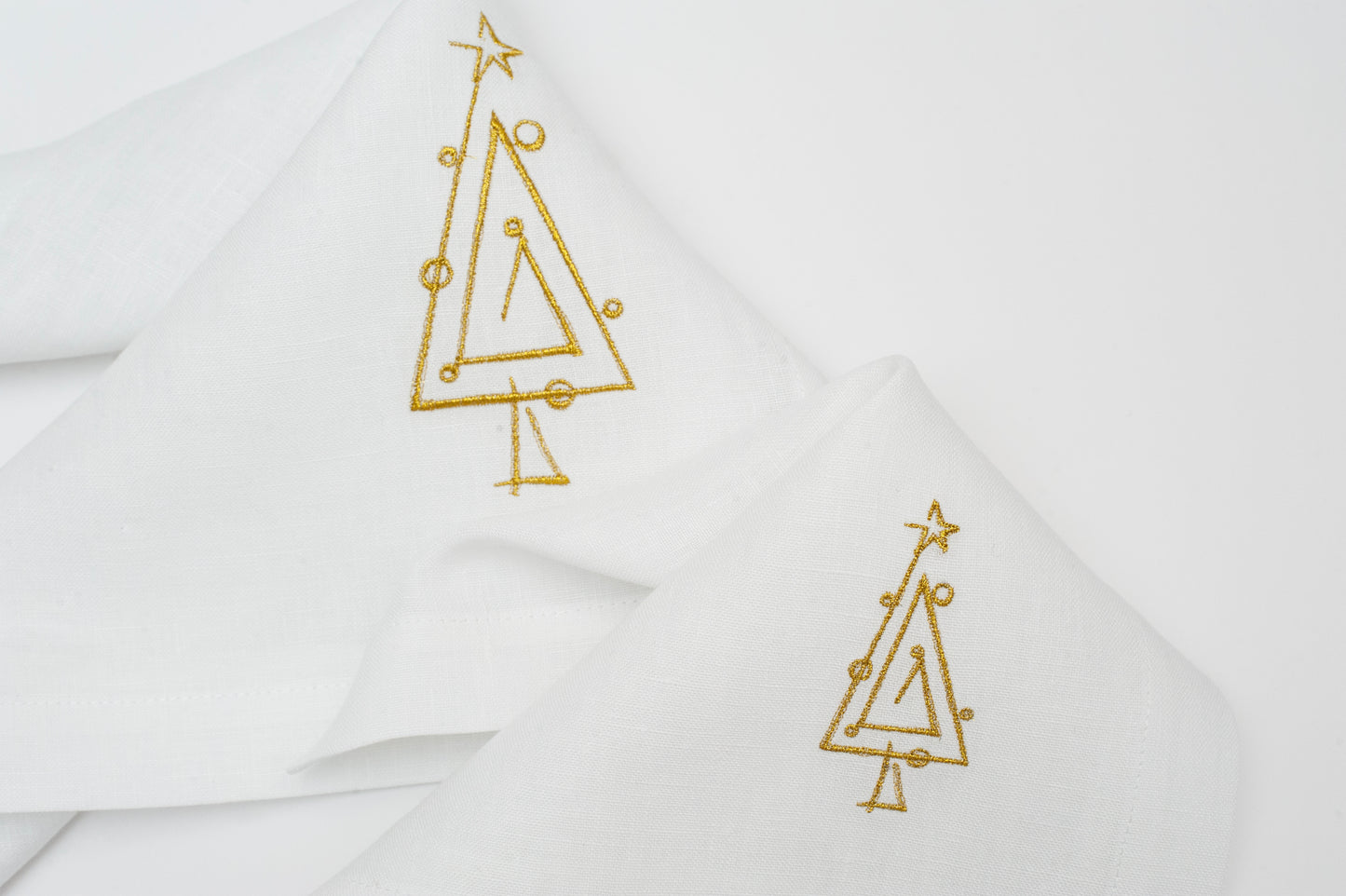 Starry Nights: Linen White Embroidered Christmas Table Napkins